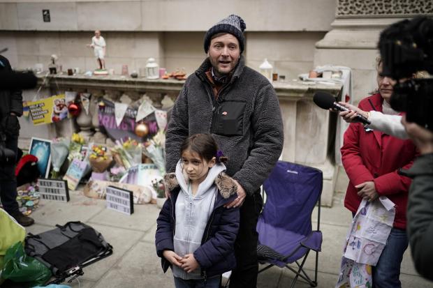 News Shopper: Richard Ratcliffe, the husband of Iranian detainee Nazanin Zaghari-Ratcliffe, with his daughter Gabriella, he is ending his hunger strike in central London after almost three weeks. Credit: PA