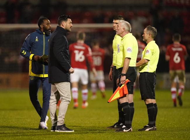 Charlton Athletic manager Johnnie Jackson speaks to officials after the Sky Bet League One match at the Mornflake Stadium, Crewe.