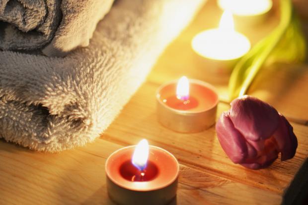 News Shopper: A pile of towels, candles and a tulip. Credit: Canva