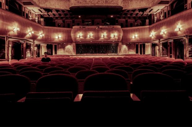 News Shopper: Rows of empty red theatre seats. Credit: Canva