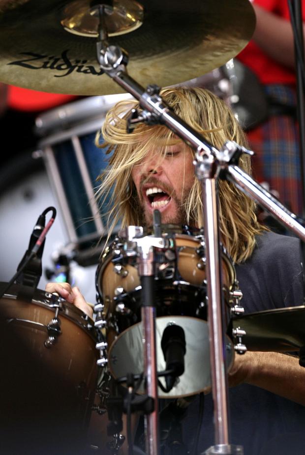 News Shopper: Taylor Hawkins performs during the Live Earth charity concert at Wembley Stadium, London (PA)