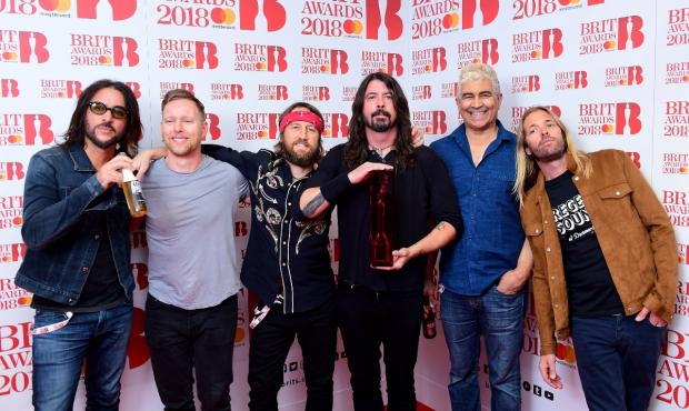 News Shopper: Foo Fighters with their award for Best International Group during the 2018 Brit Awards (PA)