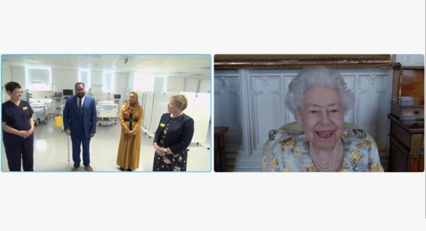 News Shopper: Queen Elizabeth II speaking to Dr Marie Healey, Divisional Director for Surgery and Critical Care; Mr Asef and Mrs Shamina Hussain; and Jackie Sullivan during a video link call (PA)
