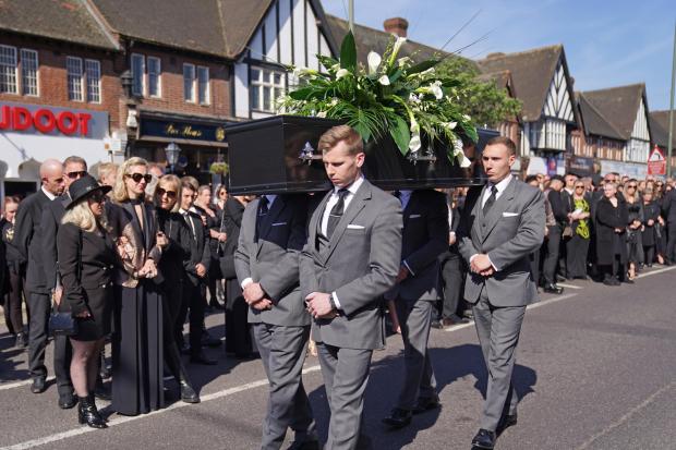 News Shopper: The coffin of The Wanted star Tom Parker is carried ahead of his funeral in Queensway, Petts Wood, in south-east London