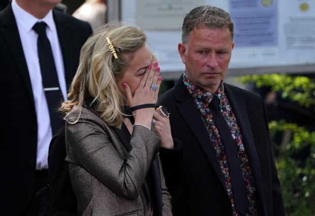 News Shopper: Kelsey Parker (centre) at the funeral of her husband and The Wanted star Tom Parker
