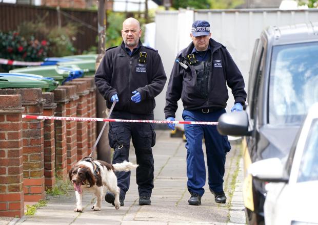 News Shopper: Police officers at the scene on Monday