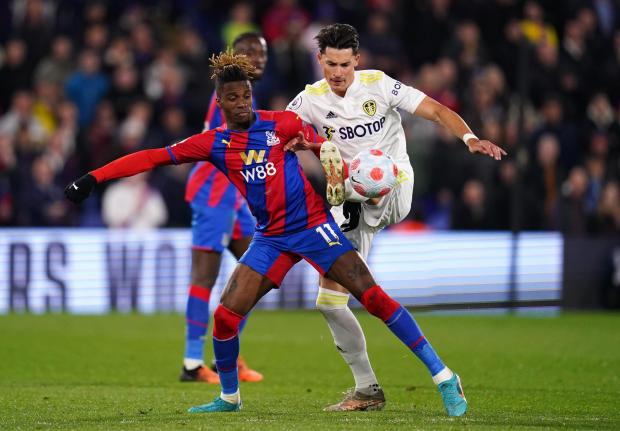 News Shopper: Crystal Palace attacker Wilfried Zaha challenges for the ball