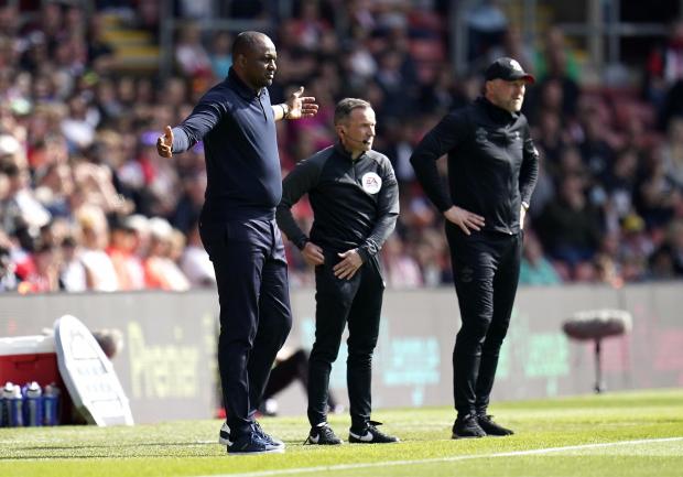 News Shopper: Crystal Palace manager Patrick Vieira (left) reacts as fourth official Keith Stroud and Southampton manager Ralph Hasenhuttl (right) look on during the Premier League match at St Mary's Stadium, Southampton