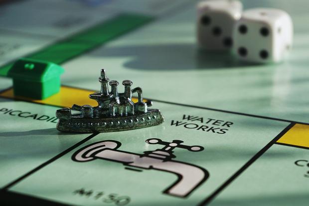 News Shopper: Part of a MONOPOLY game board (Canva)