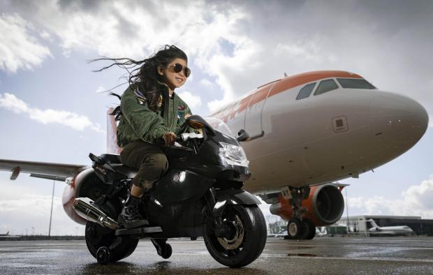 News Shopper: Rei Diec, aged 7 during filming of a parody of the movie Top Gun at Luton airport as part of easyJet's nextGen recruitment campaign. Credit: PA/easyJet