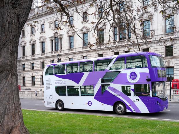 News Shopper:  The iconic red has vanished from London buses as they get a purple makeover. (PA)