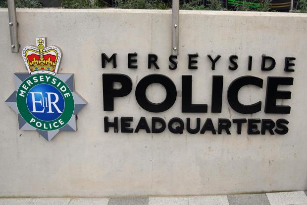 Signage outside the Merseyside Police Headquarters in Liverpool