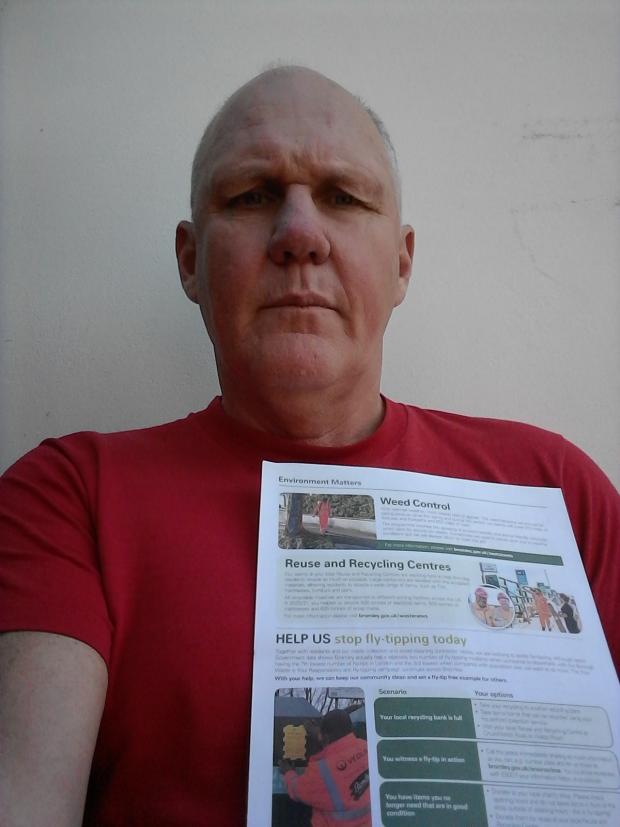 News Shopper: Chris holding a copy of Bromley Council's 'Environment Matters' newsletter