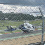 An air ambulance landing at Brands Hatch on Saturday, July 31