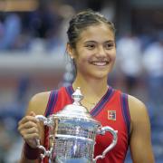 Great Britain's Emma Raducanu holds the trophy as she celebrates winning the women's singles final on day twelve of the US Open at the USTA Billie Jean King National Tennis Center, Flushing Meadows- Corona Park, New York. (photo: PA)