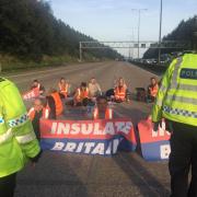 Insulate Britain of protesters occupying the clockwise and anti-clockwise lanes on the M25 in Surrey this morning. Issue date: Tuesday September 21, 2021.
