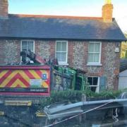 The lorry remained outside the property this morning (Facebook)