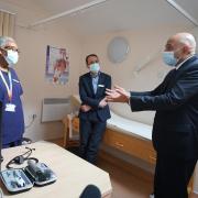 Health Secretary Sajid Javid meeting Dr Clementine Olenga-Disashi (left) and Dr Ali al-Bassam, during a visit to the Vale Medical Centre in Forest Hill, south east London. Yui Mok/PA Wire