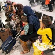 Afghan refugees arriving into Heathrow airport from Afghanistan (Dominic Lipinski/PA) (PA Wire)