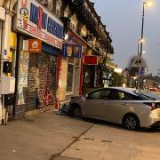 Car crashes into shop front in Brockley (photo: Ryan Garcia-Roberts)