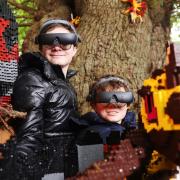 Brothers Lucca and Sonny using the eSight eyewear at the attraction (LEGOLAND Windsor)