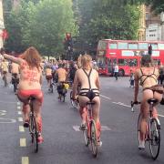 World Naked Bike Ride participants approaching
Trafalgar Sq (June 2014). Photo by: Biggsytravels