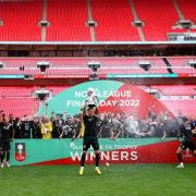 Bromley players celebrate after winning the Buildbase FA Trophy final at Wembley Stadium, London. Picture date: Sunday May 22, 2022..