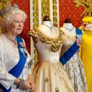 The Queen's wax figure stood next to the Royal Dress Collection at the attraction (Madame Tussauds London)