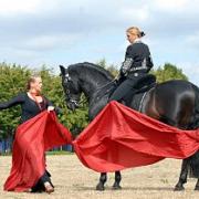 Riding on Moses is Bellinda Weymann with dancer Sarah Newman