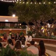 Islanders around the firepit. Love Island continues tomorrow at 9pm on ITV2 and ITV Hub. Episodes are available the following morning on BritBox. Credit: ITV
