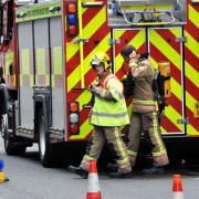 M25 partially shuts as firefighters tackle coach fire