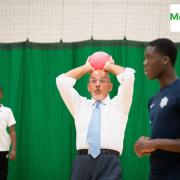 Chancellor, Nadhim Zahawi meets staff and children during a games session at a Holiday Activities and Food (HAF) club at Sydenham School in south east London where he was responding to the release of the UK inflation July 2022 figures (photo: PA)