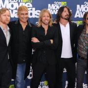 Foo Fighters (left to right) Nate Mendel, Pat Smear, Taylor Hawkins, Dave Grohl and Chris Shiflett at 2011 MTV Movie Awards. Picture: PA