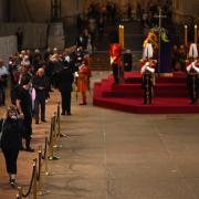 Members of the public pay their respects as the vigil begins around the coffin of Queen Elizabeth II in Westminster Hall, London, where it will lie in state ahead of her funeral on Monday