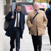 Bob Stewart (right) arrives at court
