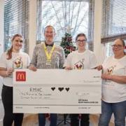 The £1,500 cheque with Dean Jeffrey and members of the RMHC