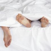 Bed sharing stock image