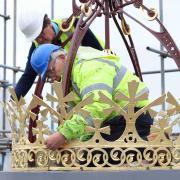 The crown or 'corona' has been gilded as part of a project to restore the historic bandstand