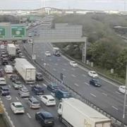 There are traffic queues and delays following a crash on the M25 near the Dartford Crossing.