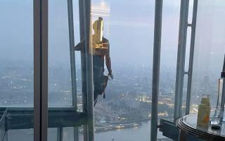 A couple were staying on the 40th floor of The Shard in London and were in bed when they spotted a man waving and climbing past their window at 6am on Sunday (photo: Paul Curphey)