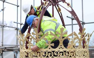 The crown or 'corona' has been gilded as part of a project to restore the historic bandstand