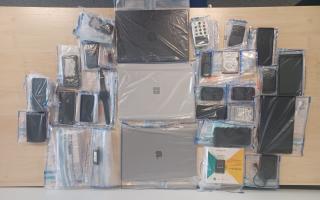 The police seized items in a Bromley raid as part of an international takedown of a cyber gang