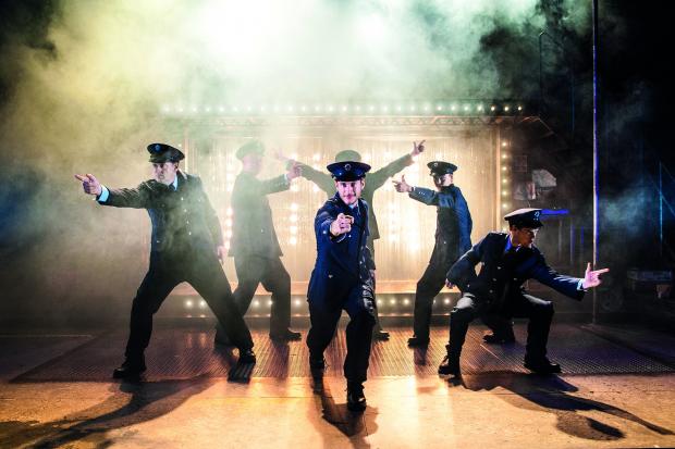 News Shopper: Gary Lucy, centre, in The Full Monty