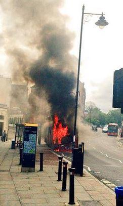 The bus in flames. Picture: Chris Holland