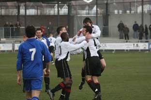 Adam Flanagan is congratulated after making it 2-2 early in the second half. STEVEN HARRINGTON.