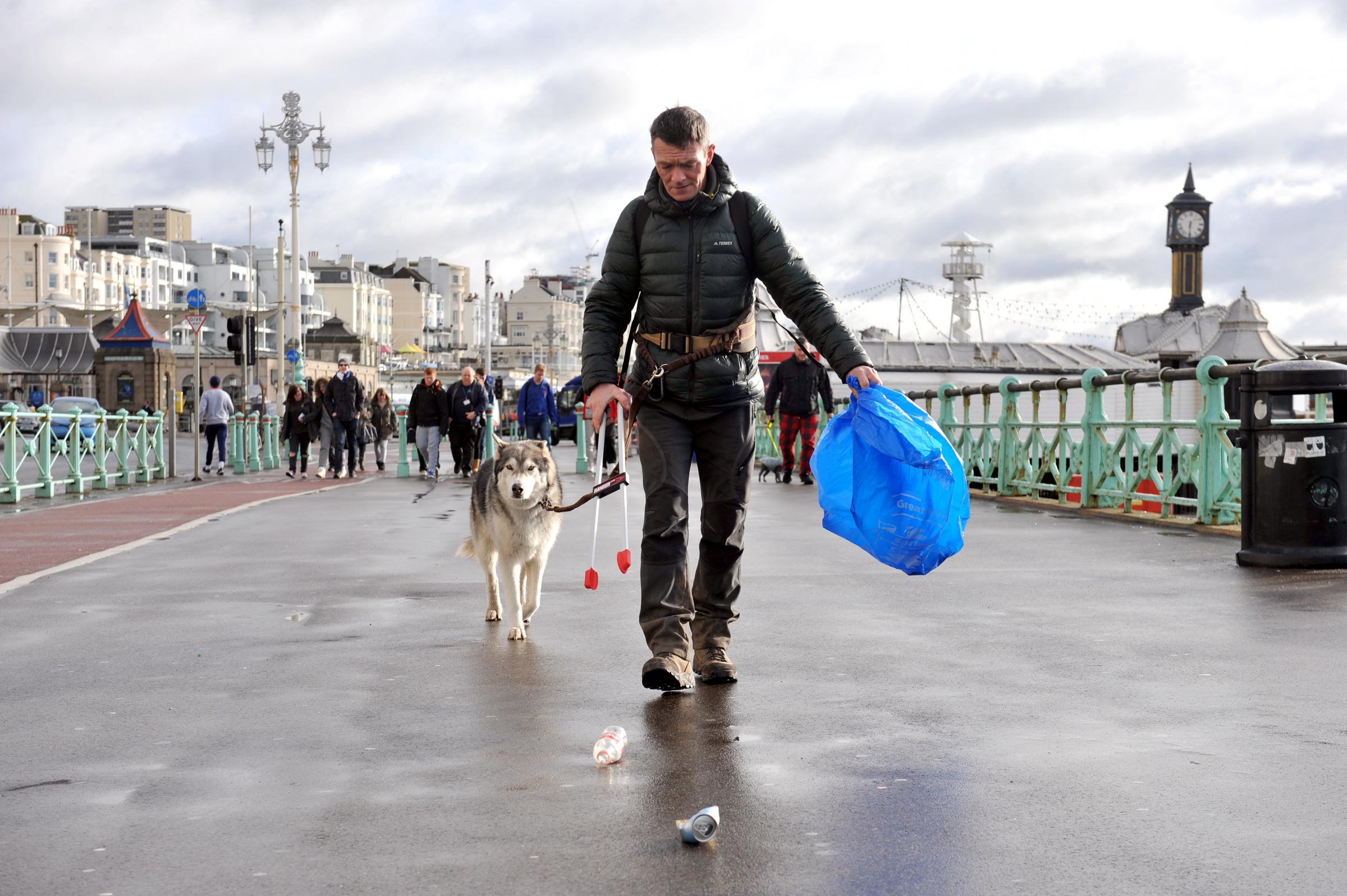 Wayne Dixon - KeepBritain Tidy (KBT)s most loved ambassador - and his dog Koda in Brighton. In a bid to clean up the beaches ahead of the UKs biggest annual litter clean-up campaign, the Great British Spring Clean that is back for another round in